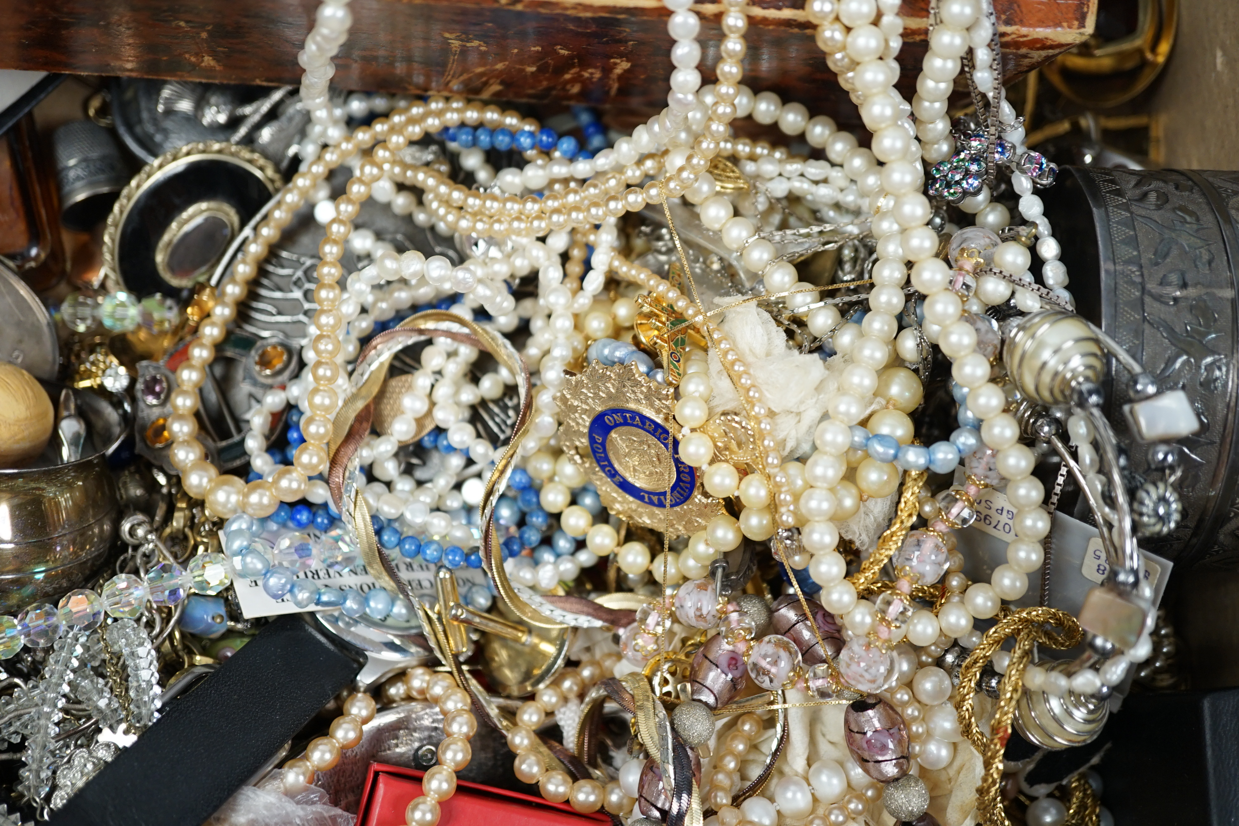 A quantity of assorted mainly costume jewellery and wrist watches, including a 19th century yellow metal and split coral set mourning brooch, a Scottish hardstone set white metal brooch and a Victorian silver oval locket